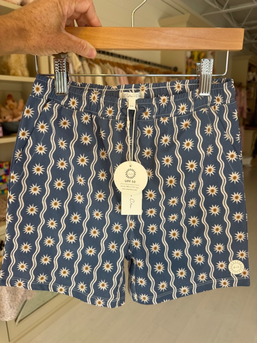 R+Co Navy Swim Trunks with White and Tan Starburst Pattern